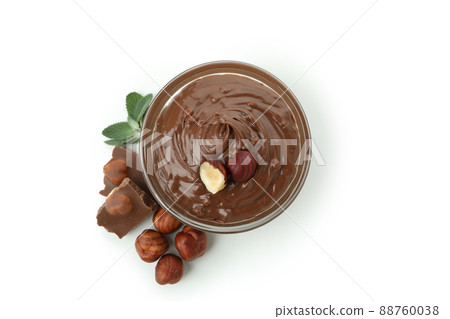 Bowl with chocolate paste and nuts isolated on white background 88760038