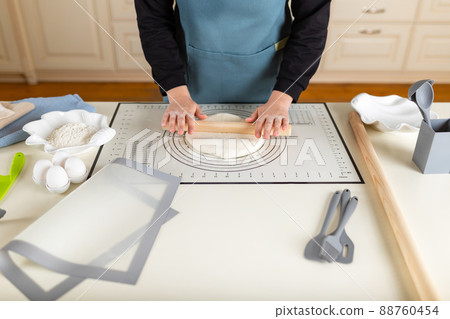 A large kitchen work table on which the chef rolls out wheat dough for baking 88760454