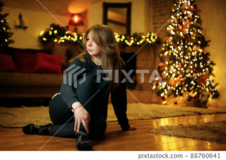 Lonely young woman bored on new years eve 88760641