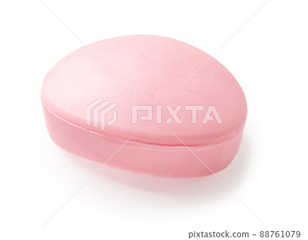 Oval shaped pink bar of soap isolated on a white background. Ellipse floral soap bar cutout. 88761079
