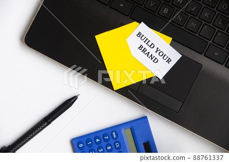 Build your brand text on small piece of paper in an envelope with office concept background Build your brand text on small piece of paper in an envelope with office concept background 88761337