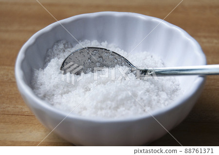 Close up of salt intake with spoon. Healthy food concept 88761371