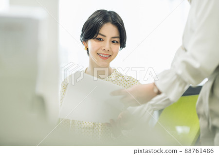 Career woman checking documents 88761486