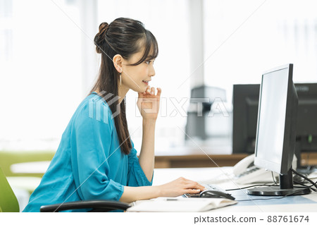 Woman working in the office Woman working in the office 88761674