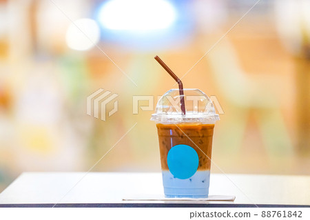 Coffee with blue milk at the buttom 88761842