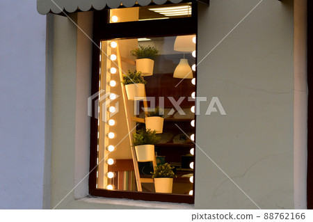 Showcase in the store illuminated by lights. 88762166