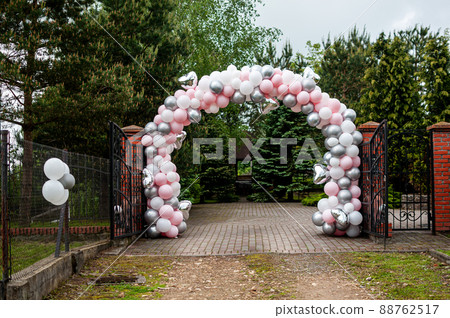Wedding arch made of colorfull inflatable balloons 88762517