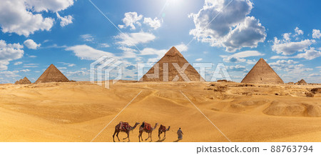 Panorama of Giza with the Pyramids, camels and a bedouin Panorama of Giza with the Pyramids, camels and a bedouin 88763794