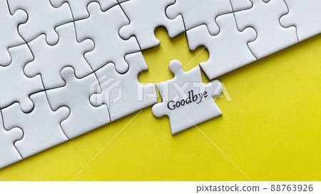 Top view of text - I am in. On yellow background of white jigsaw missing pieces. 88763926