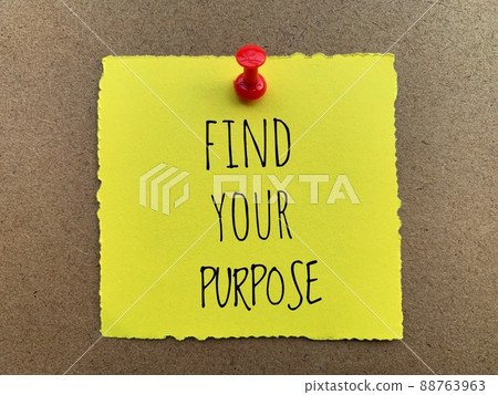Find your purpose text on yellow torn notepad 88763963