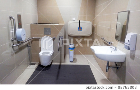 KUALA LUMPUR, MALAYSIA -JANUARY 12, 2017: Interior of public toilet for disable people combine with nappy change facilities. Designed special and proportion for their needs.  88765808