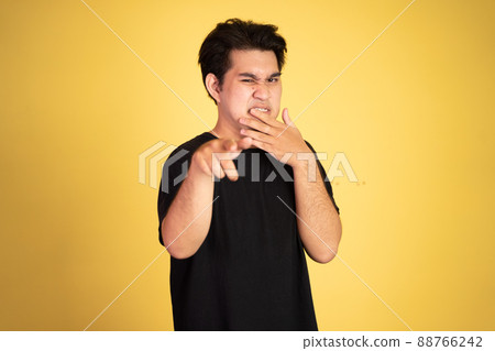man cover his nose and feeling disgusted by the smell man cover his nose and feeling disgusted by the smell 88766242