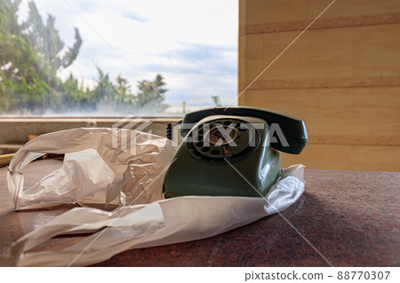 Abandoned retro phone Abandoned retro phone 88770307