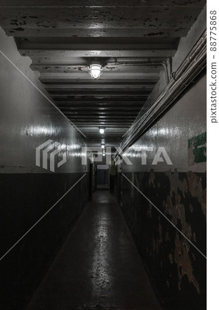 Underground military bunker corridor, dark interior 88775868
