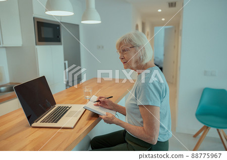 Photo of confident aged lady at home 88775967