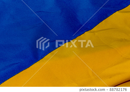 Ukraine National flag. Fabric textured flag of Ukraine. Blue and yellow colors Ukraine National flag. Fabric textured flag of Ukraine. Blue and yellow colors 88782176