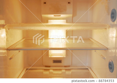 empty refrigerator after cleaning and prepare to contain food 88784353