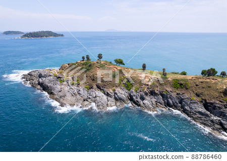 Aerial view phuket seashore Wave crashing on rocks at Laem promthep cape beautiful sea in Phuket Thailand.Phuket view point is famous tourist destination at Thailand 88786460