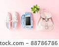 Women clothes with empty phone. Online shopping 88786786
