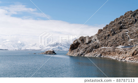 Vast scenery of Lake of Van with snow and winter landscape. Lake Van is the largest lake in Turkey. Vast scenery of Lake of Van with snow and winter landscape. Lake Van is the largest lake in Turkey. 88787113