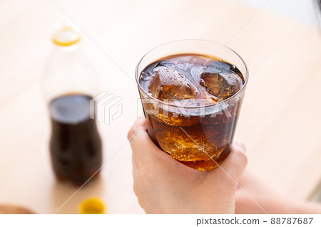 Middle woman drinking cola 88787687