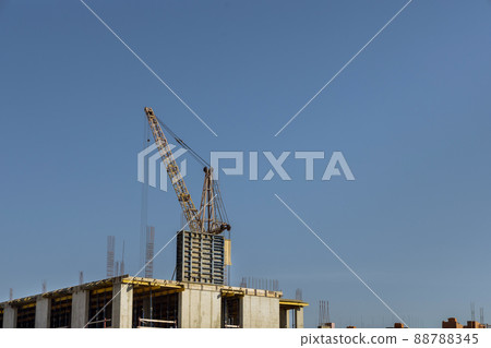 Tower cranes near high rise building with concrete building Tower cranes near high rise building with concrete building 88788345