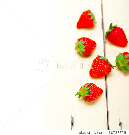 fresh organic strawberry over white wood fresh organic strawberry over white wood 88788726