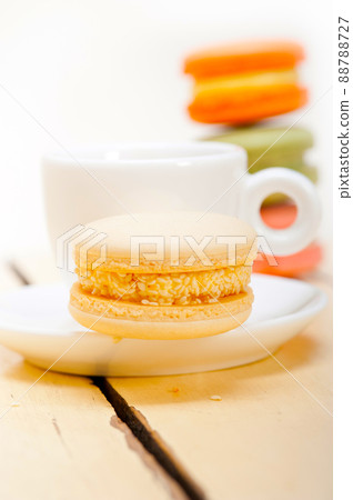 colorful macaroons with espresso coffee colorful macaroons with espresso coffee 88788727