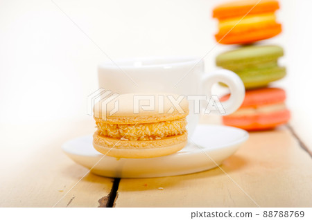 colorful macaroons with espresso coffee colorful macaroons with espresso coffee 88788769
