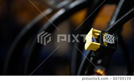 Plastic connector of wiring harnesses. Industrial background with copy space. Automobile industry 88789139