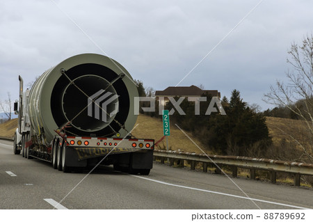 Heavy freight truck of bulky goods on highway Heavy freight truck of bulky goods on highway 88789692