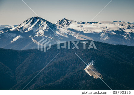 Mountains, coniferous forest in the snow, spring, winter Mountains, coniferous forest in the snow, spring, winter 88790356