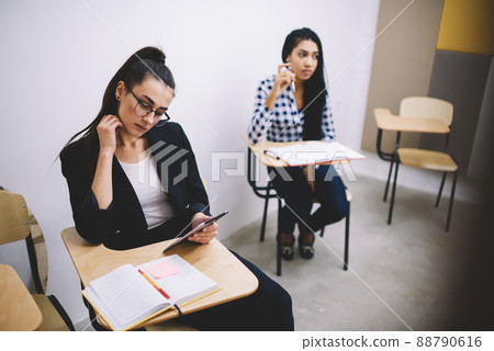 Students listening to lecture in classroom Students listening to lecture in classroom 88790616