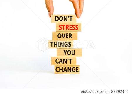 Do not stress symbol. Wooden blocks with words Do not stress over things you can not change. Beautiful white background copy space. Businessman hand. Business motivational not stress concept. 88792491