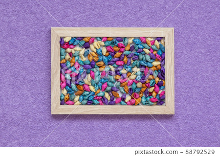 Frame on a lilac suede background. Inside are colorful shells. The concept of vacation, trip to the sea 88792529