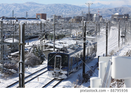 Nagano Shinano Railway in the snow 88795936