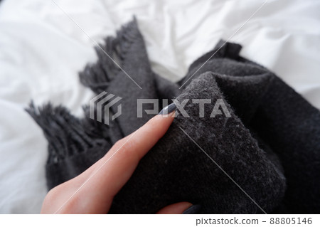 Women's hands and gray fabric 88805146