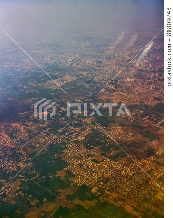Journey by air. A view of city from plane. Journey by air. A view of city from plane. 88809243