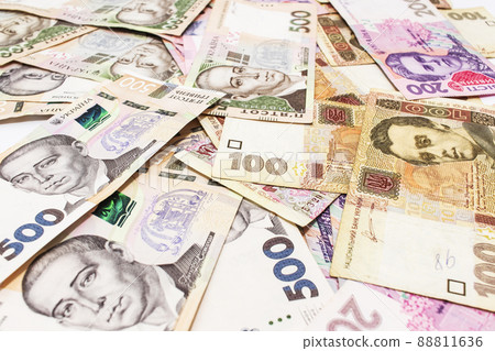 New banknotes with a face value of hryvnia. Money background. Ukrainian money. Business concept. New banknotes with a face value of hryvnia. Money background. Ukrainian money. Business concept. 88811636