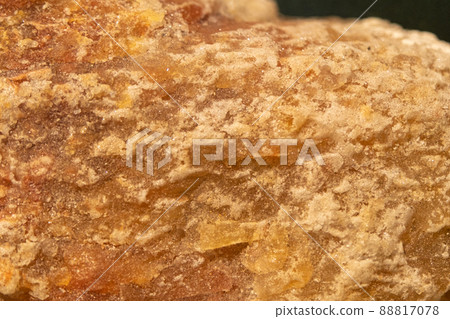 Carnallite mineral close-up. Mineral orange color, background and texture Carnallite mineral close-up. Mineral orange color, background and texture 88817078