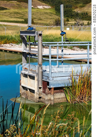 A fishway entrance at the top of a small barrier 88820218
