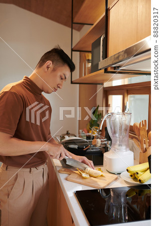 Man Cooking Breakfast Smoothie Man Cooking Breakfast Smoothie 88820317