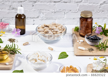 Pills and vitamin complexes to maintain immunity on white background. Pills and vitamin complexes to maintain immunity on white background. 88820322