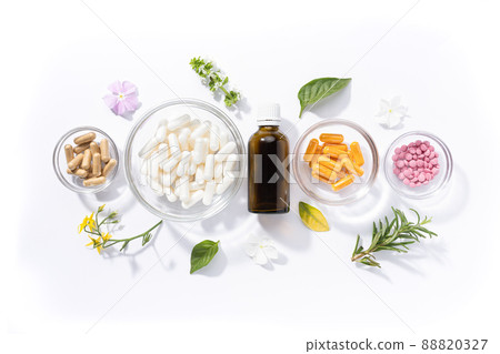 Flat lay composition of various vitamin capsules and dietary supplements isolated on white background. Vitamin complexes concept. Flat lay composition of various vitamin capsules and dietary supplements isolated on white background. Vitamin complexes concept. 88820327