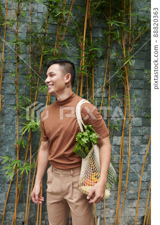 Young Man Shopping Local 88820363
