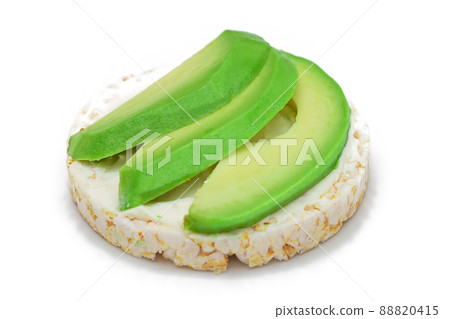 Rice Cake Sandwich with Fresh Avocado and Cream Cheese - Isolated Rice Cake Sandwich with Fresh Avocado and Cream Cheese - Isolated 88820415