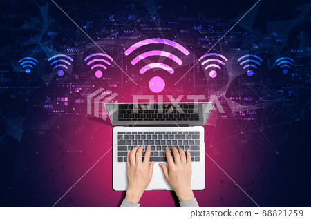 Wifi theme with person using laptop 88821259