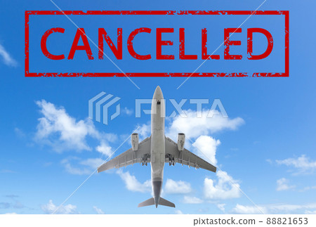 Airplane on blue sky with sign cancelled Airplane on blue sky with sign cancelled 88821653