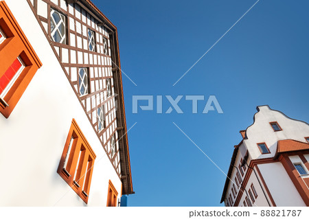 Crop of Rauschen building facade with windows and roof at sunny day on blue sky background 88821787