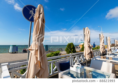 Summer wooden cafe decorated flowers in resort town Summer wooden cafe decorated flowers in resort town 88821993